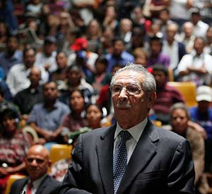 Former Guatemalan dictator Efrain Rios Montt prepares to speak in his genocide trial at the Supreme Court of Justice in Guatemala City May 9. A judge sentenced Rios Montt, 86, to 80 years in prison for crimes carried out in 1982, when he allegedly initiated a policy of extermination of Mayans for their ties to Marxist guerrillas. (CNS photo/Jorge Dan Lopez, Reuters)