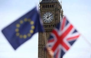 A European Union flag and British Union flag are seen at Parliament Square in London June 19. Voters in the United Kingdom voted June 23 to leave the European Union. (CNS photo/Neil Hall, Reuters)