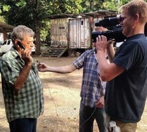 Filmmakers interview Capuchin Fr. Wally Kasuboski during filming of “From Mass to the Mountain,” a documentary film that will be shown during the Sept. 22-Oct. 6 Milwaukee Film Festival. (Submitted photo courtesy Kurt Sensenbrenner)