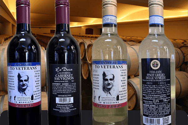 Four bottles of wine, two white and two red